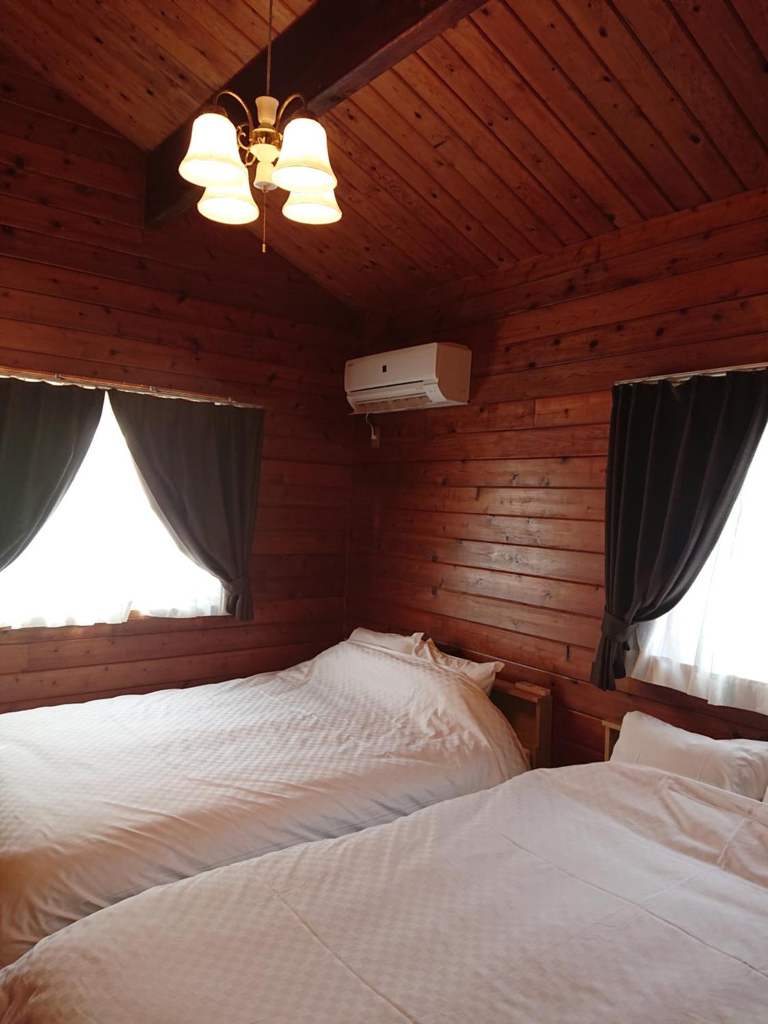 מוטובו Garden Beach House חדר תמונה